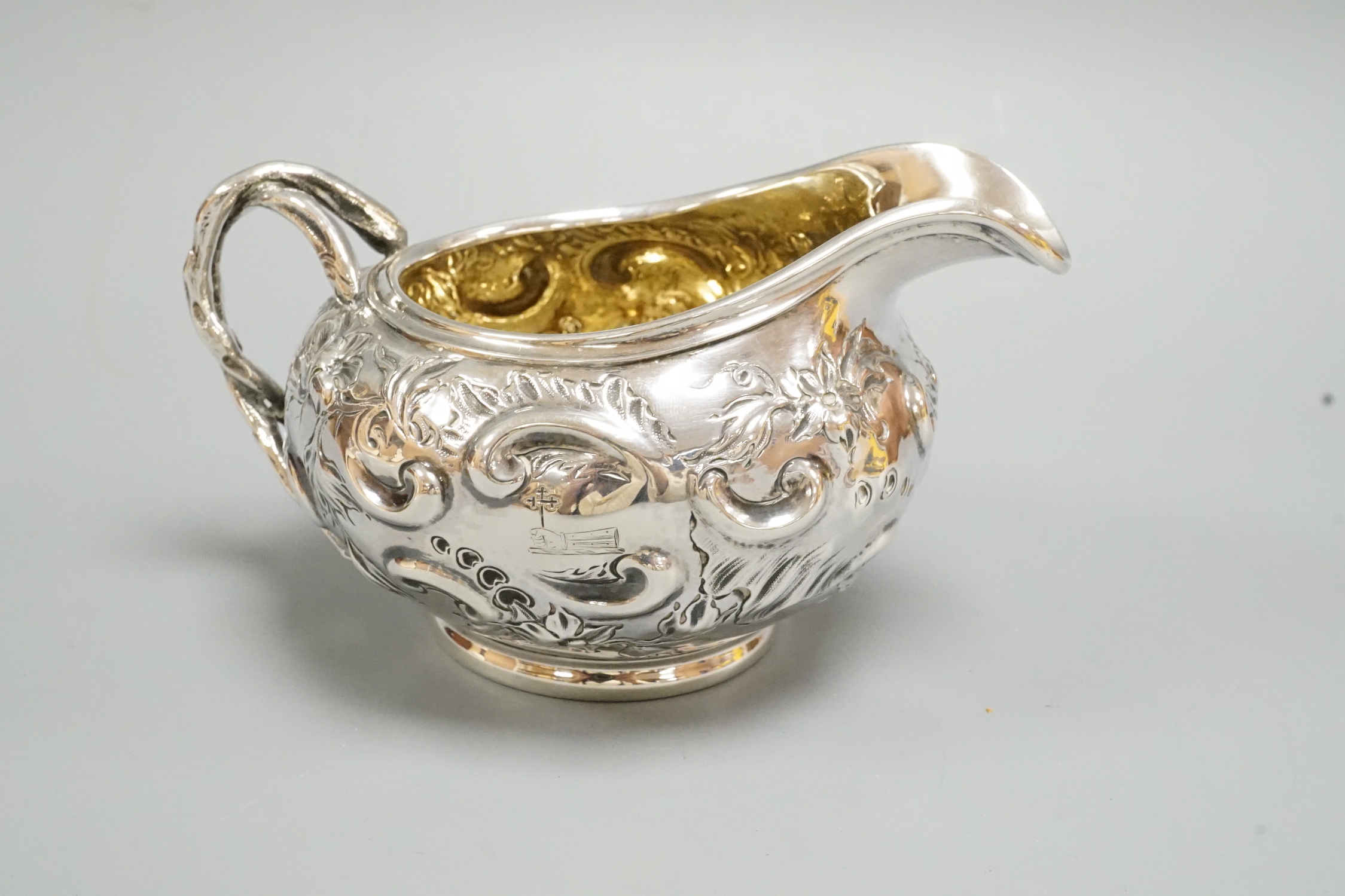An early Victorian silver cream jug, by Charles & George Fox, London, 1844, length 14.1cm, 6.2oz.